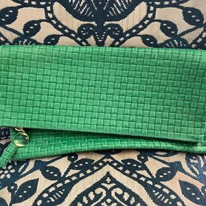 Green fold over leather clutch